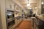Gourmet kitchen with stainless steel appliances and gas range